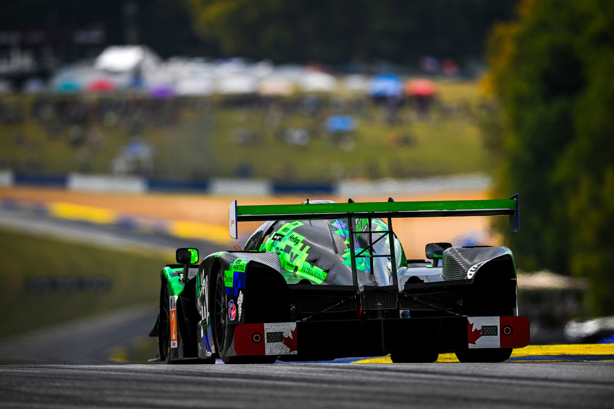 Back of the Shopify LMP3 atop the Esses at Road Atlanta, October 2026